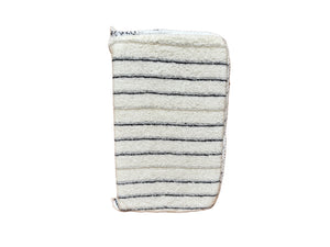 A white terry cloth wax applicator with black stripes.